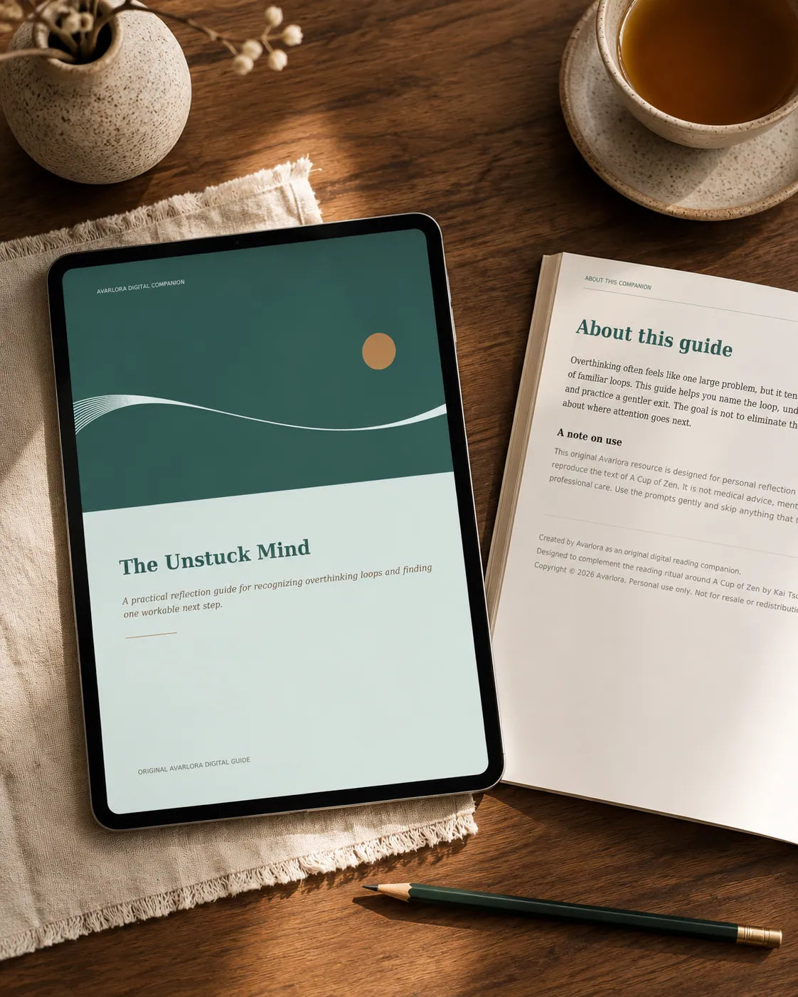 The Unstuck Mind digital guide displayed on a tablet beside an interior-page preview.